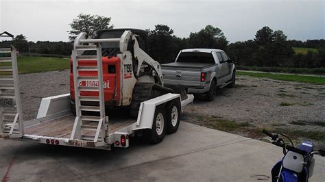 Towing Bobcat skid steer with Powerboost. : r/f150 